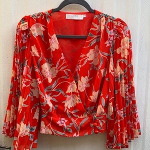 Pleated sleeve floral wrap top